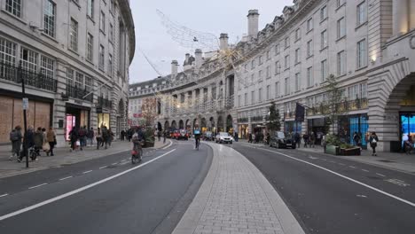 Smooth-dolly-forward-gimbal-shot-of-London-Regents-street-decorated-for-Christmas