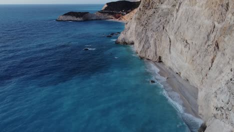Drone-explores-the-scenic-coastline-of-Lefkada-Island,-Porto-Katsiki-beach