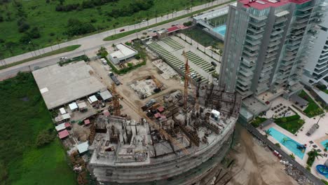 Brids-eye-view-over-construction-tower-crane-at-building-site-in-mexico
