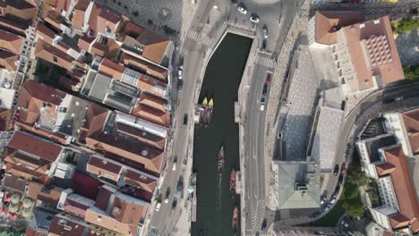 Moliceiros-with-tourists-on-busy-Ria-de-Aveiro-urban-canals