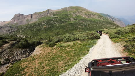 POV-from-rooftop-of-4WD-vehicle-following-another-on-Black-Bear-Pass-trail
