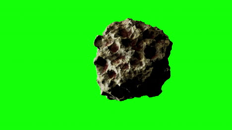 Ein-Braungrauer-Asteroid-Mit-Kerben-Und-Dellen-Tritt-Ins-Bild-Und-Rast-Auf-Greenscreen-In-Richtung-Bildschirmmitte