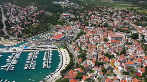 Crikvenica-Town-On-Adriatic-Sea,-beach-and-waterfront-aerial-view,-Kvarner-Bay-Region-of-Croatia---drone-shot