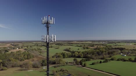 Rural-cell-phone-tower-in-the-middle-of-nowhere-with-5G-technology-updates-needed-stock-video-by-aerial-drone-footage-2