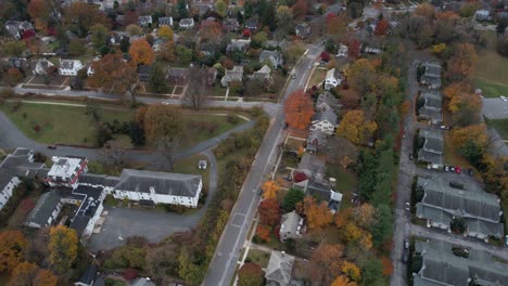 Aerial-View-of-Residential-Neighborhood-in-American-Suburbia-at-Fall-Season,-Streets-and-Houses,-Drone-Shot