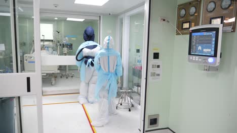 Medic-Staffs-Putting-On-PAPR-Suits-Before-Entering-COVD-19-Ward