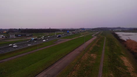 Aerial-View-Of-E31-Motorway-With-Traffic-Moving-Both-Ways-In-Hendrik-Ido-Ambacht