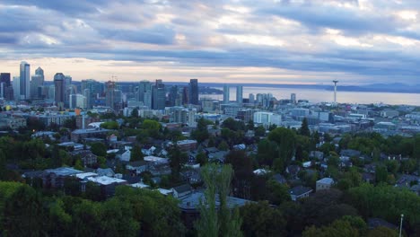 Wide-aerial-shot-pulling-away-from-Seattle's-dense-downtown-district,-circa-2016