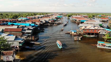 Floating-village-on-Tonle-Sap-lake,-aerial-drone-view,-Cambodia