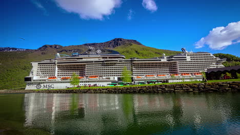 Time-lapse-shot-of-tourist-entering-and-leaving-MSC-Cruise-Ship-at-Flam-Port-in-Norway---Wide-shot