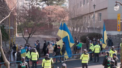 Ukrainians-Protesters-march-against-the-Russian-invasion-of-Ukraine-in-Seoul-walking-with-flags-and-Posters-towards-Russian-embassy