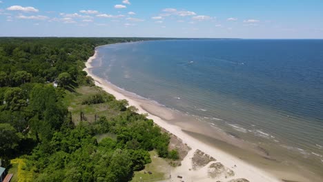 Aerial-footage-of-a-beautiful-beach-on-a-nice-hot-summer-day