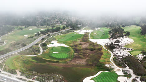 Scenic-view-of-the-golf-field,-Monterey-Bay,-on-the-coast-by-Pacific-Ocean