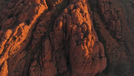Aerial-shot-lowering-over-Utah's-Snow-Canyon-State-Park-during-sunrise