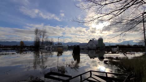 A-devastating-shot-of-low-lying-farm-and-surround-land-completely-submerged-under-water,-heavy-rains-have-caused-flooding-along-the-Fraser-River-Valley-in-Abbotsford,-Columbia,-Canada