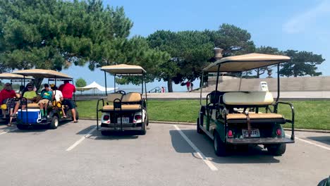 Rented-Golf-Carts-Parked-at-Perry's-Victory-International-Peace-Memorial,-Put-in-Bay,-Ohio-USA