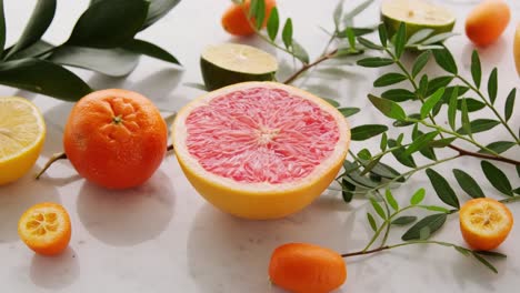 Smooth-panning-shot-of-the-citrous-fruits-lemon-tangerine-and-grapefruit