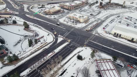 Drone-Aerial-View-of-Snow-Covered-Commercial-Area-Intersection-in-Superior-Colorado-Boulder-County-USA-After-Marshall-Fire-Wildfire-Disaster