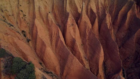 Drone-top-view-of-rare-sandstone-mountain-formation-in-Spain,Europe-during-sunset-time---Cárcavas,Madrid
