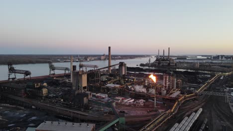 Steel-mill-at-Zug-island-producing-iron,-dolly-forward-aerial-shot,-Detroit,-Michigan