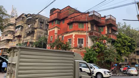 Timelapse-of-An-old-red-vintage-building-of-the-city-Kolkata,-the-city-of-joy