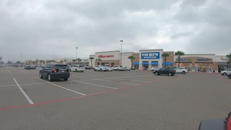 POV-while-driving-through-parking-lot-at-Sharyland-Towne-Crossing-on-a-quiet-winter-afternoon