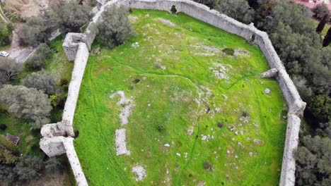 Stunning-aerial-view-flight-bird's-eye-view-drone-footage-of-castle-ruins-of-a-byzantine-fortress-of-13th-century-wild-nature-Corfu-Greece