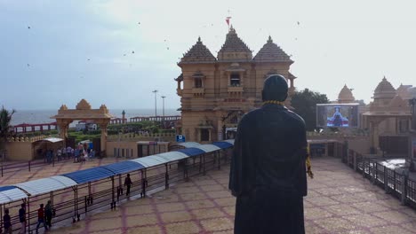 Aerial-shot-of-entry-gate-of-Somnath-mandir-of-Gujrat-with-the-Arabian-Sea-in-the-background