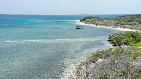 Drone-flying-over-Caribbean-waters-of-Isla-Cabra,-Montecristi-in-Dominican-Republic