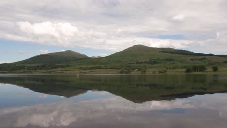 Green-Hills-with-a-calm-loch-in-front