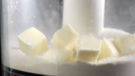 Butter-cubes-falling-into-a-mixer