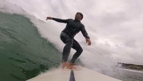Goofy-Surfer-Riding-Blue-Wave-getting-good-snap-against-the-lip-at-slow-motion-mode,-Sintra-2022
