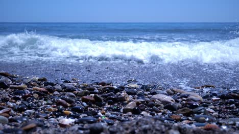 Mediterranean-Sea-Waves-Crashing-On-Rocky-Coastline-Of-Beach