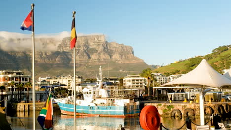 Flags-flapping-at-marina---V-and-A-Waterfront-with-Table-Mountain-views