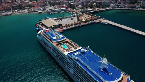 Aerial-top-view-of-cruise-ship-in-harbor-of-Turkish-resort-in-Kusadasi