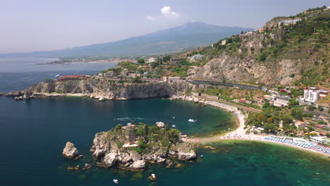 Drone-shot-of-the-Isola-Bella-coastline-and-the-Ionian-Sea