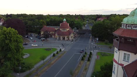 Low-traffic-road-with-cycling-and-driving-Gorgeous-aerial-view-flight-sinking-down-drone-footage-of-mexikoplatz-berlin-zehlendorf-Summer-2022-Cinematic-view-from-above-Tourist-Guide-by-Philipp-Marnitz