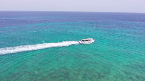 Ferry-Cruising-Playa-la-Ensenada-Island,-Dominican-Republic
