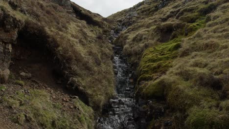 Wide-Pan-Right-of-a-Stream-in-the-Faroe-Islands