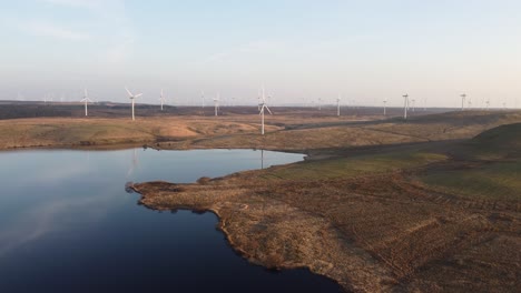 Aerial-forward-view-of-wind-turbines-in-remote-Scottish-location