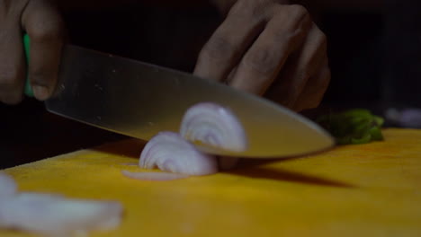 cutting-onion-for-pizza-closeup-view
