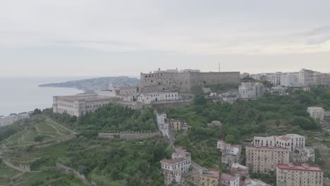Aerial-footage-flying-towards-Castel-Sant'Elmo-in-Naples,-Italy