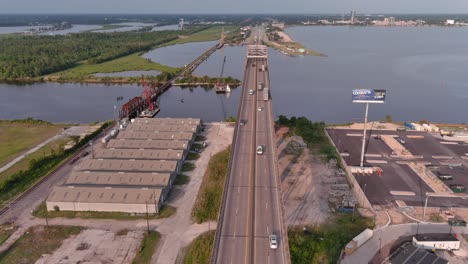Aerial-of-cars-on-traveling-over-the-Mississippi-river-on-the-Horace-Wilkinson-Bridge