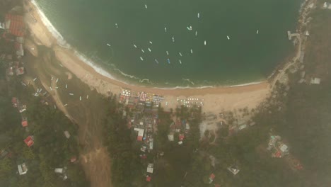 Bird's-Eye-View-Of-Tropical-Beach-Of-Yelapa-In-Jalisco,-Mexico-On-A-Cloudy-Day---drone-shot
