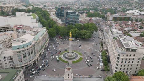 Drone-shot-of-a-traffic-around-Saint-George-monument-on-the-Liberty-Square