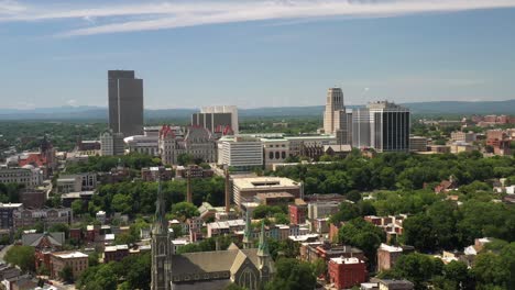 Albany,-New-York-skyline-wide-shot-drone-video-moving-in-with-trees