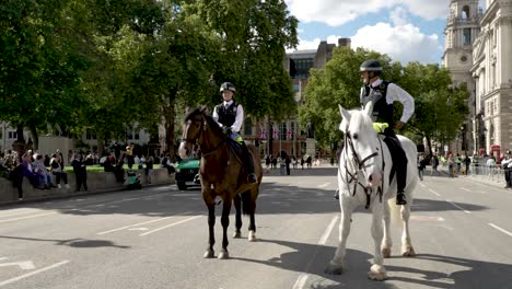 Pair-Of-Mounted-Metropolitan-Police-Standing-On-Closed-Round-Around-Parliament-Square-In-Westminster