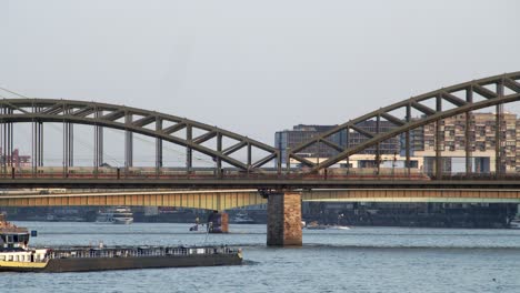 An-oil-gas-tanker-passes-under-the-Hohenzollern-Bridge-in-Cologne