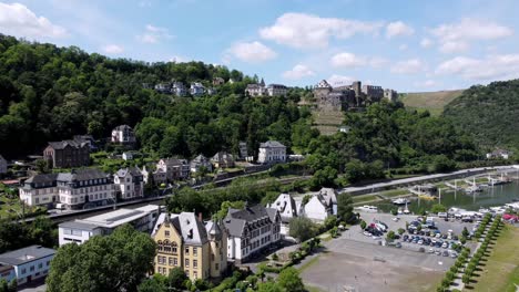 Aerial-flying-drone-shot-of-the-Rhine-River-Valley-and-Old-Architecture---including-medieval-castles,-old-buildings,-and-natural-forested-alpine-hills