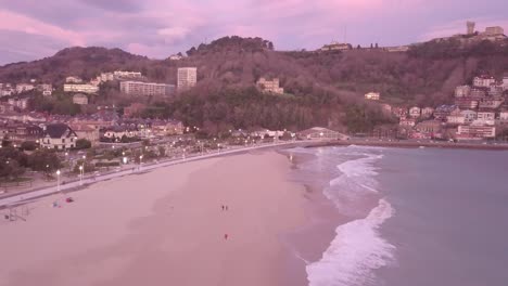 Dreamy-romantic-sunrise-on-a-beach-in-San-Sebastian,-Spain